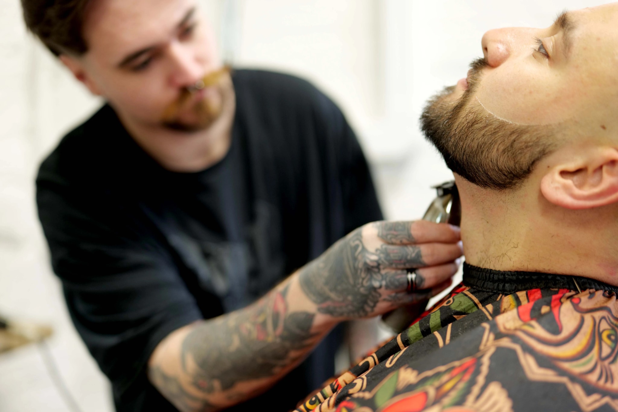 Cameron Hughes cutting a fade at AH Creative barbershop Neath